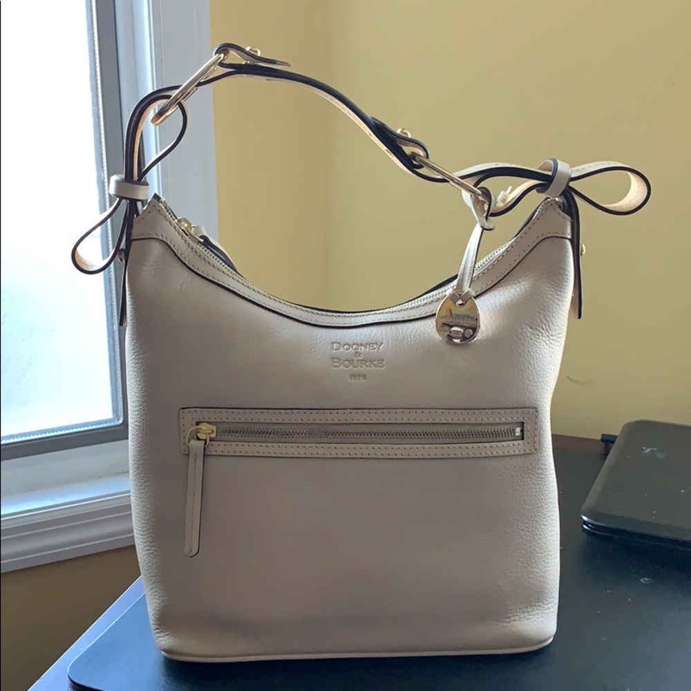 Dooney & Bourke 1975, leather hobo bag cream color